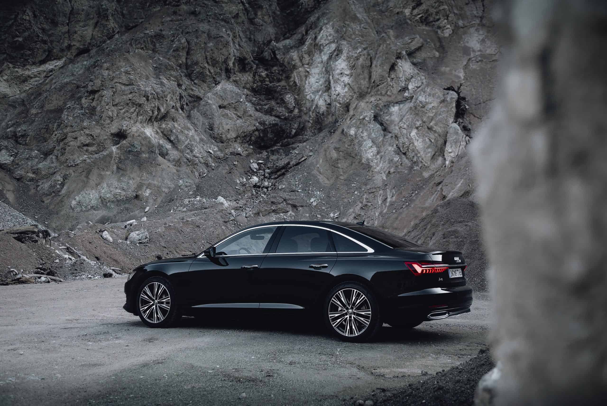 Elegant black car for VIP airport chauffeur services in Manchester.